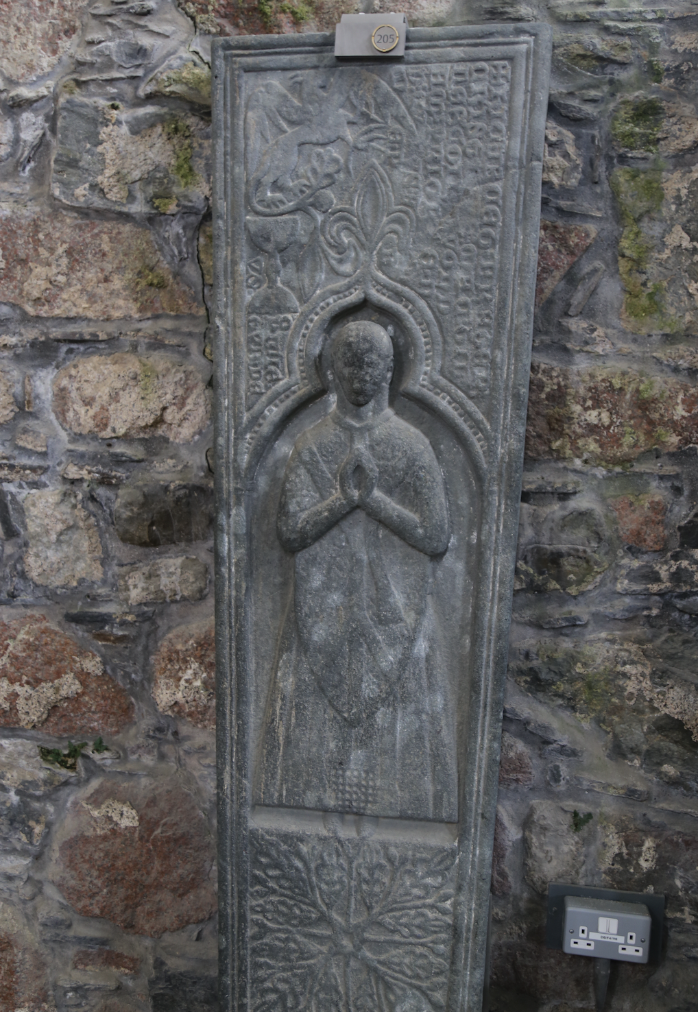 Medieval Grave slab of a cleric. Now displayed in St. Oran's Chapel in the Iona Graveyard. 