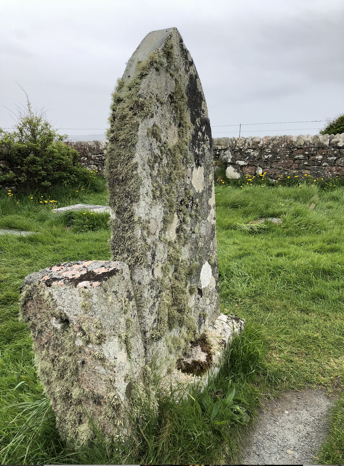 Old Gravestone deteriorating from exposure at the Iona Abbey Graveyard. 